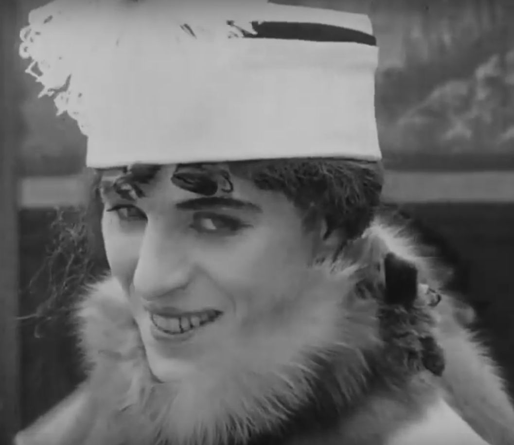 Charlie Chaplin in drag to play a practical joke
