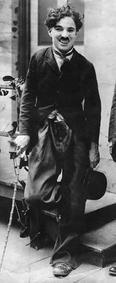 Charlie Chaplin in his Little Tramp costume