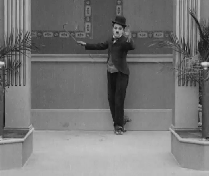 Charlie Chaplin on skates - The Rink