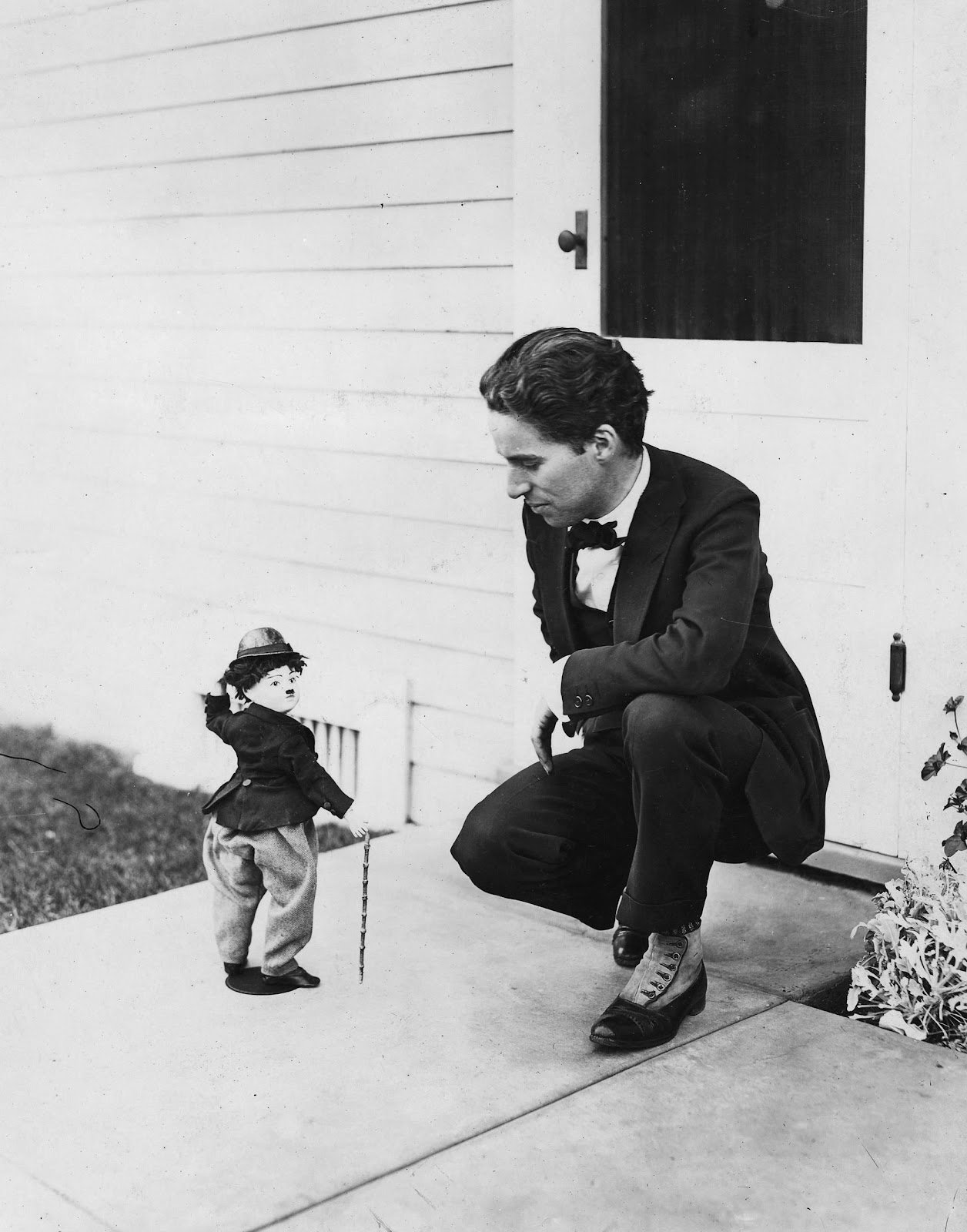 Charlie Chaplin and a Little Tramp doll